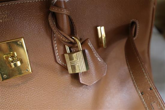 A Hermes tan leather Birkin handbag, with dust bag (puchased 1998 from Paris store) Width 35cm